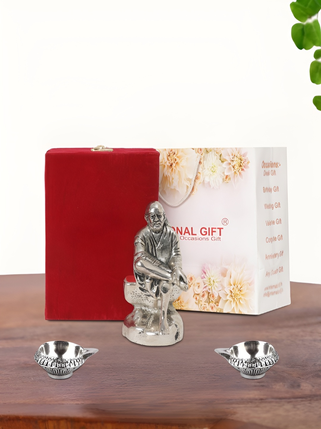 

INTERNATIONAL GIFT Silver Plated Sai Baba Idol with 2 Diya Box and Bag