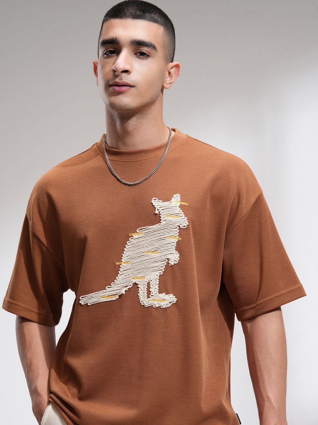

HIGHLANDER Men Round Neck Oversized Embellished T-Shirt, Brown