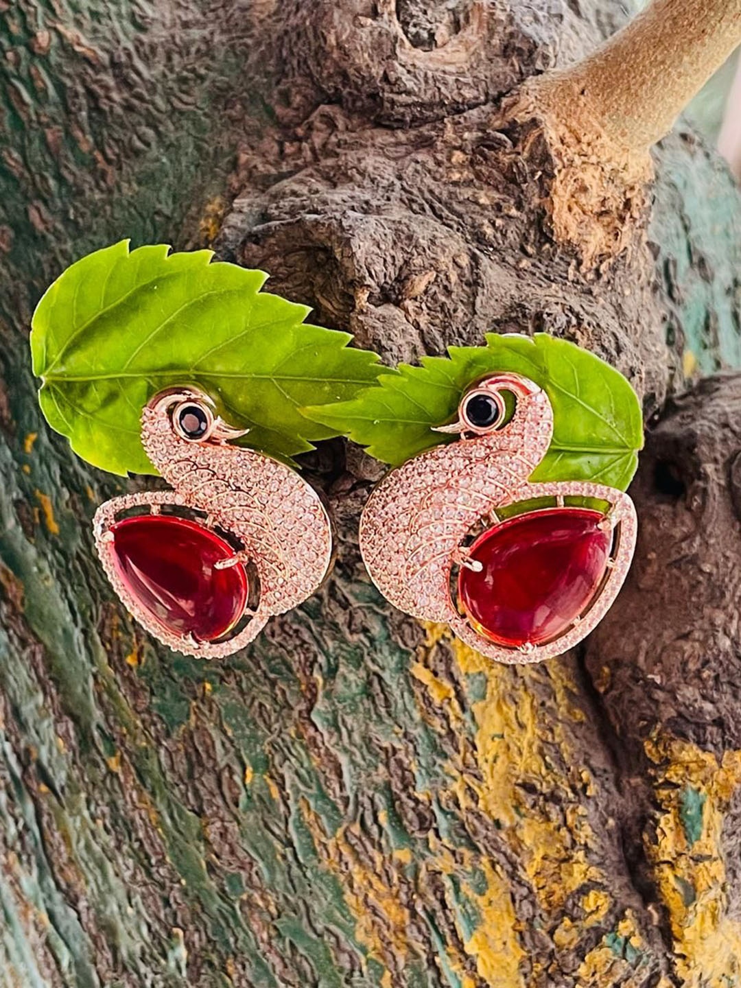 

MONI LIFESTYLE Gold-Plated Artificial Stones Studded Contemporary Studs