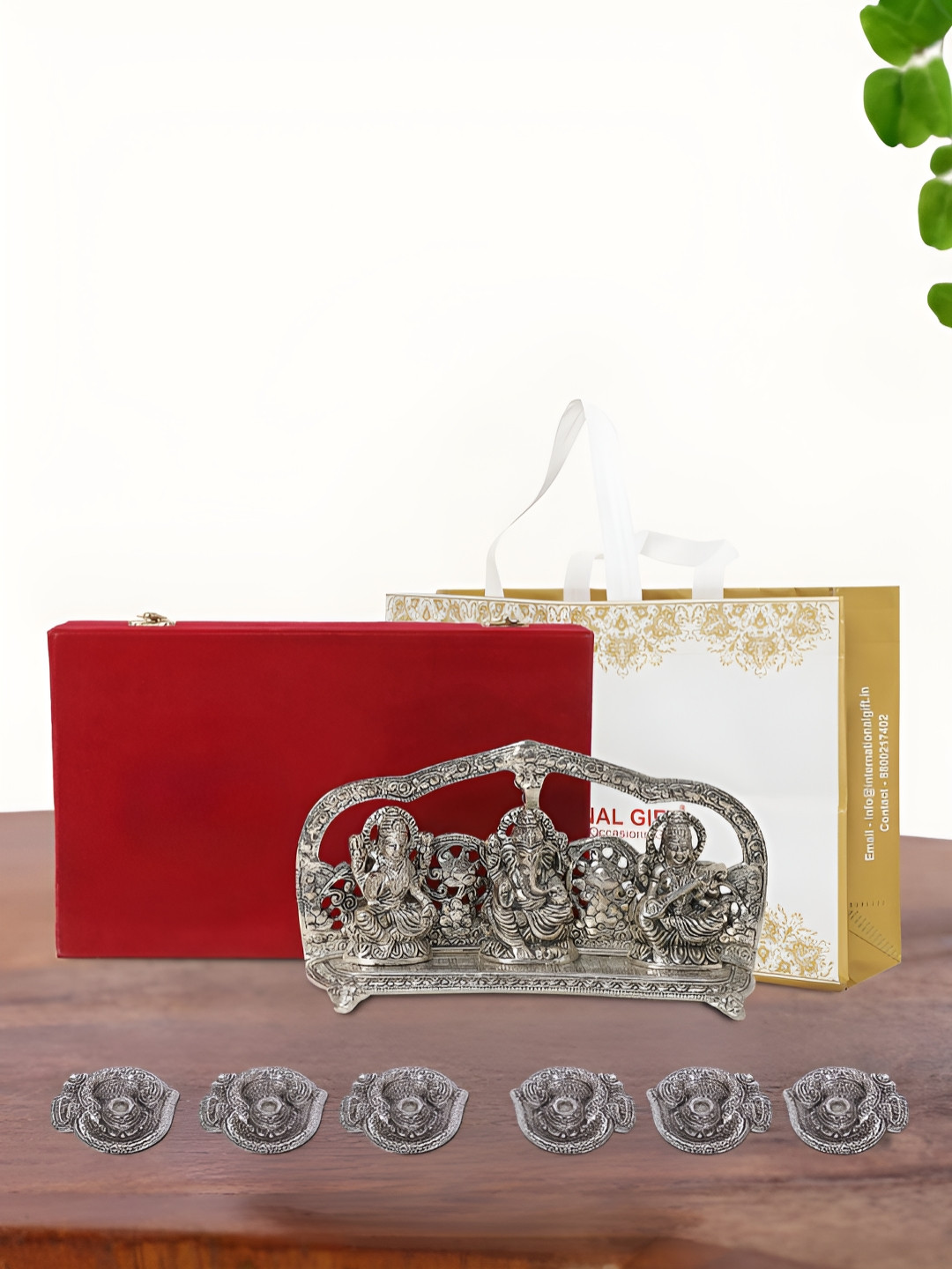 

INTERNATIONAL GIFT Silver Plated Laxmi Ganesh Saraswati Idol with 6 Diya and Box