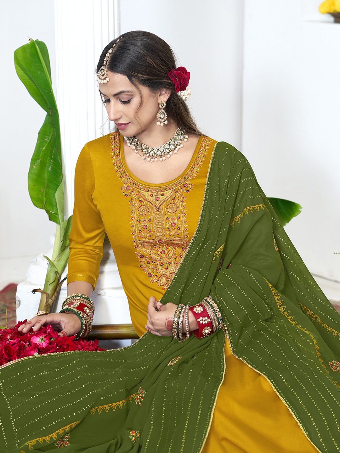 

Anouk Yellow Zari Ethnic Motifs Embroidered Unstitched Dress Material