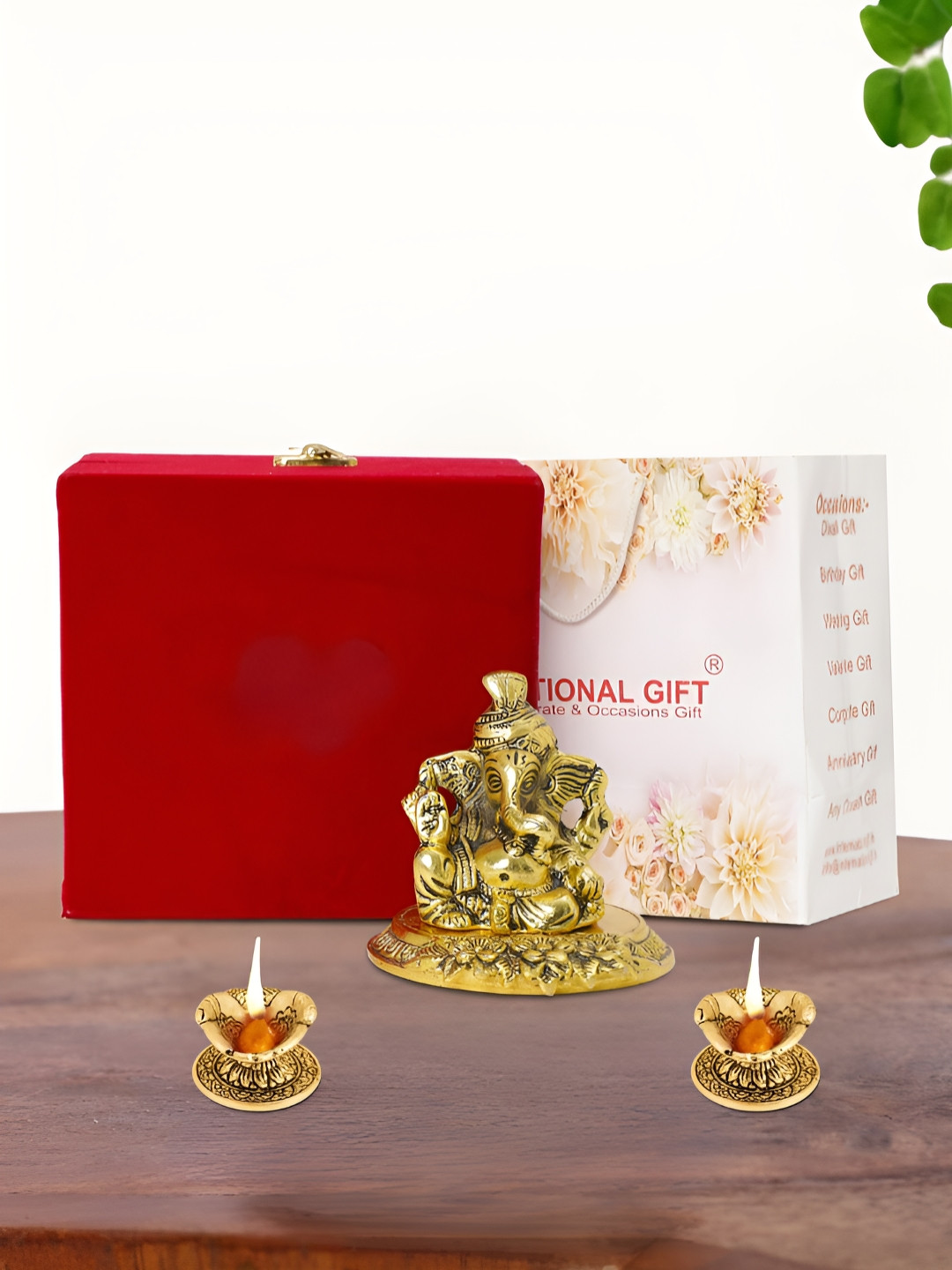 

INTERNATIONAL GIFT Gold Plated Pagdi Ganesh Idol with 2 Diya Box and Bag