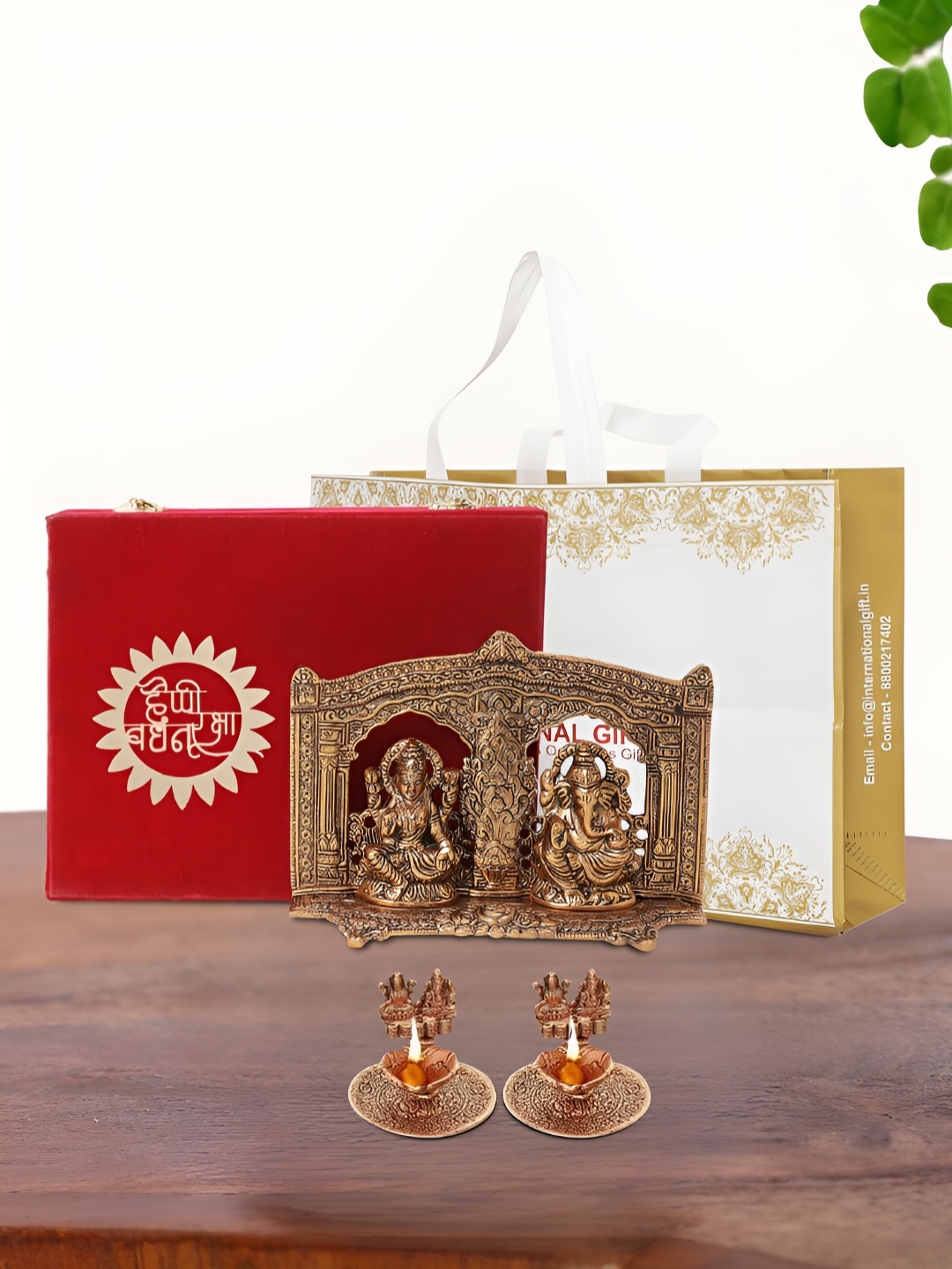 

INTERNATIONAL GIFT Brown Laxmi Ganesh Idol with 2 Diya Box and Bag, Copper