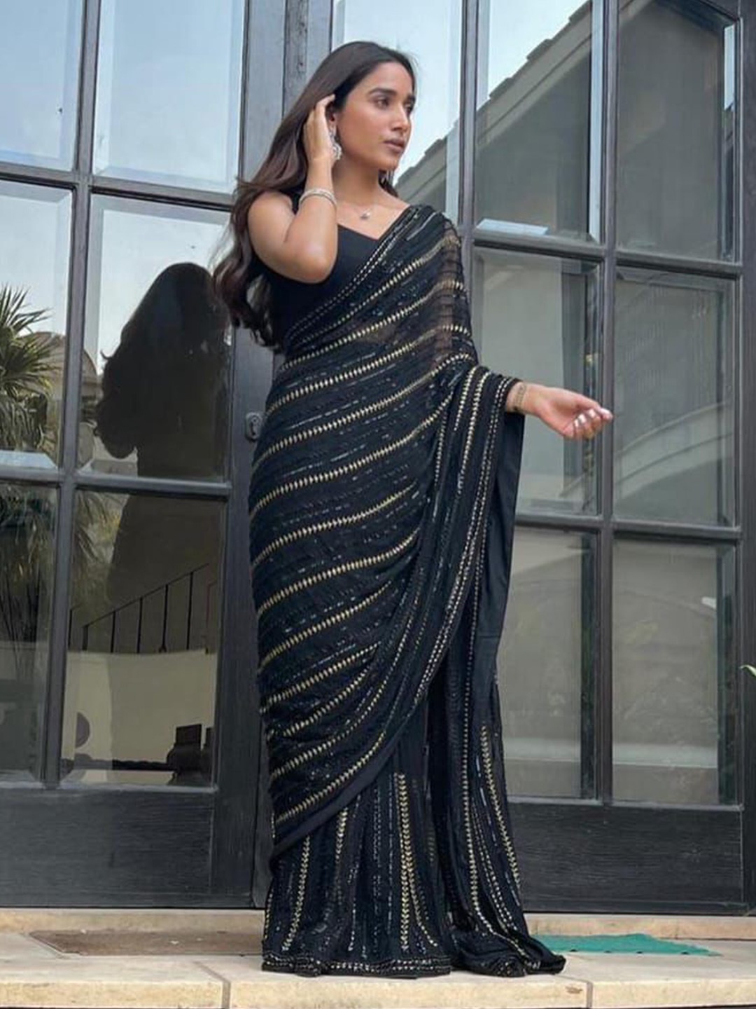 

PAYAL CREATION Striped Zari Pure Georgette Saree, Black
