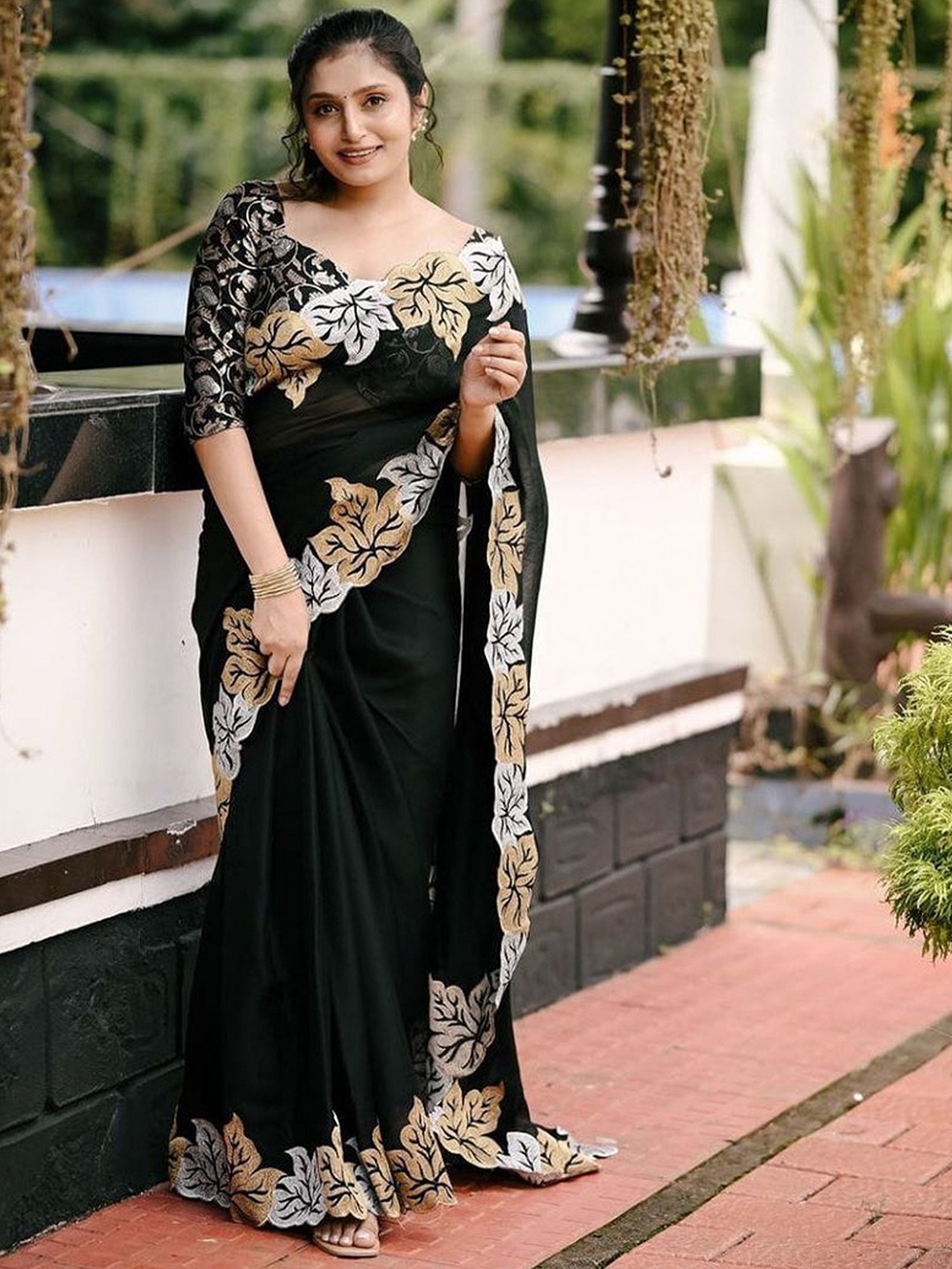 

Divyadham Textiles Embellished Embroidered Pure Georgette Block Print Saree, Black