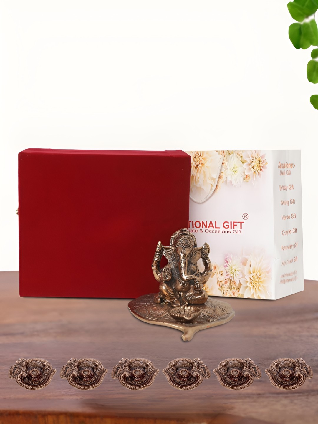 

INTERNATIONAL GIFT Brown Leaf Ganesh Idol with 6 Diya Box and Bag, Copper
