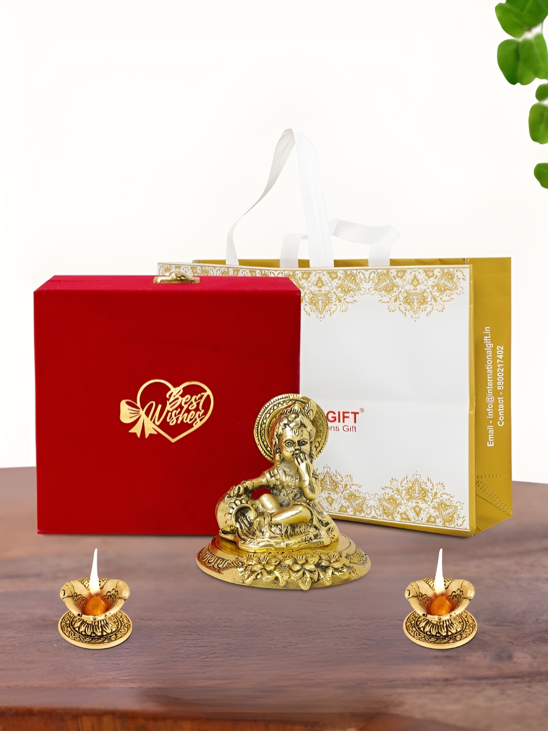 

INTERNATIONAL GIFT Gold Plated Laddu Gopal Idol with 2 Diya Box and Bag