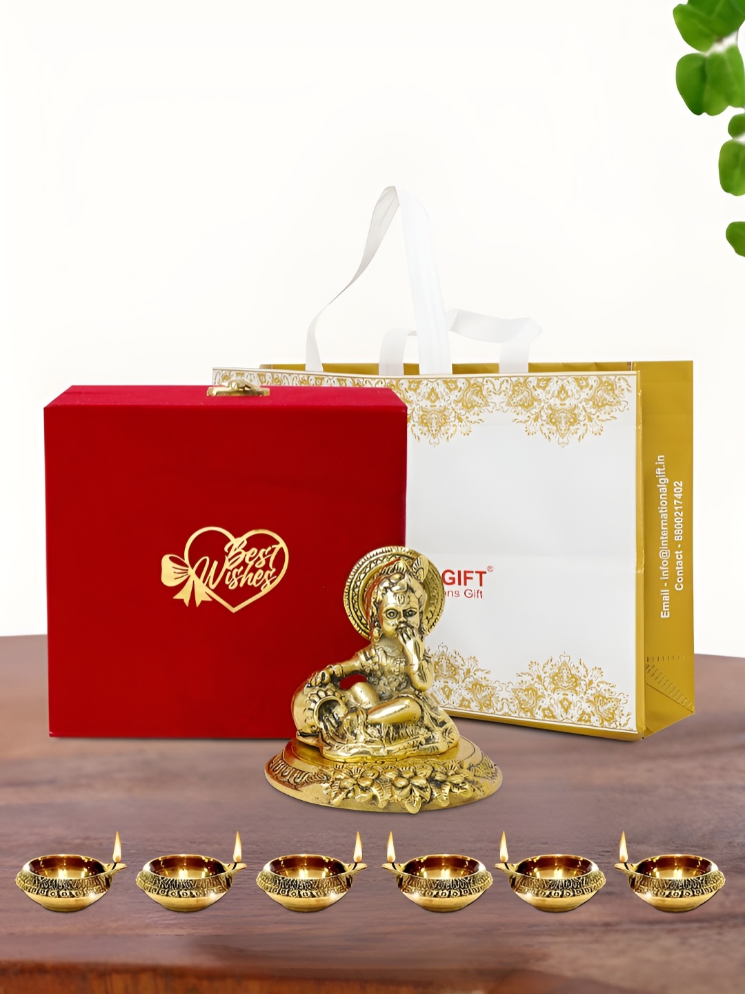 

INTERNATIONAL GIFT Gold Plated Laddu Gopal Idol with 6 Diya Box and Bag