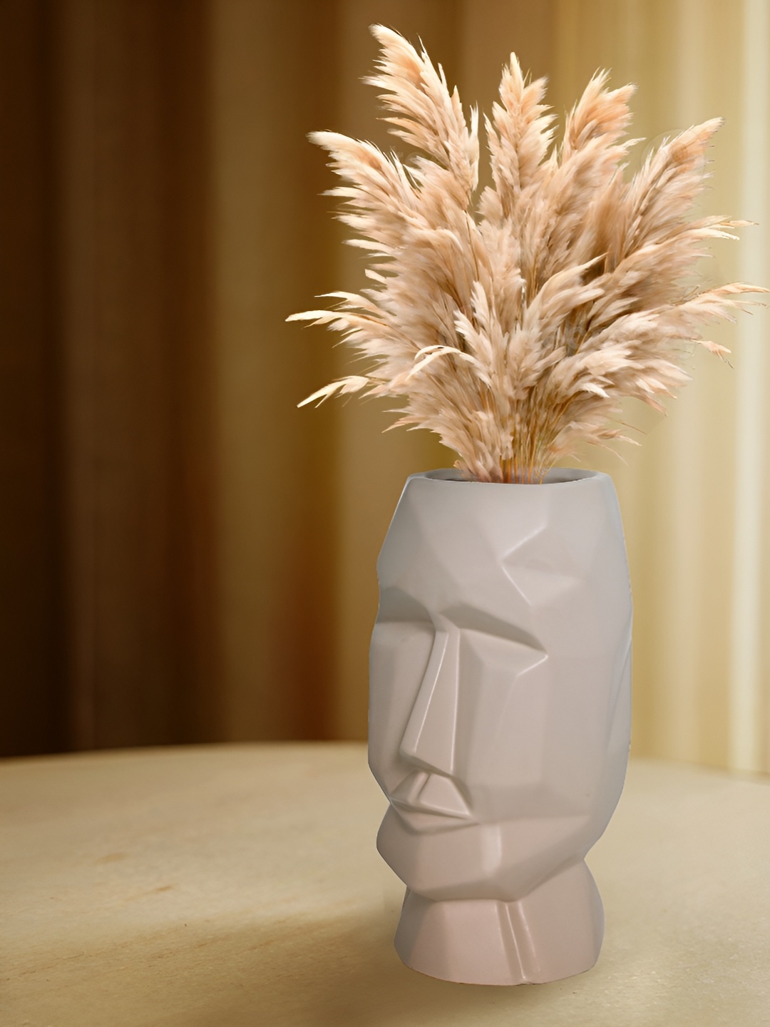 

Cortina White Textured Face Shaped Flower Vases