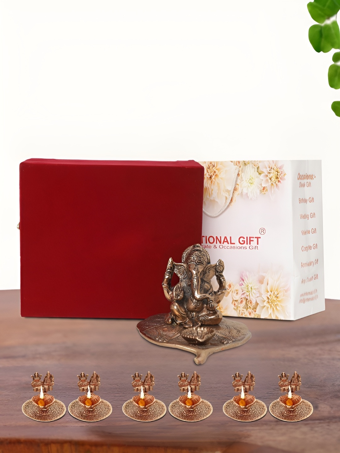 

INTERNATIONAL GIFT Brown Leaf Ganesh Idol with 6 Diya Box and Bag, Copper