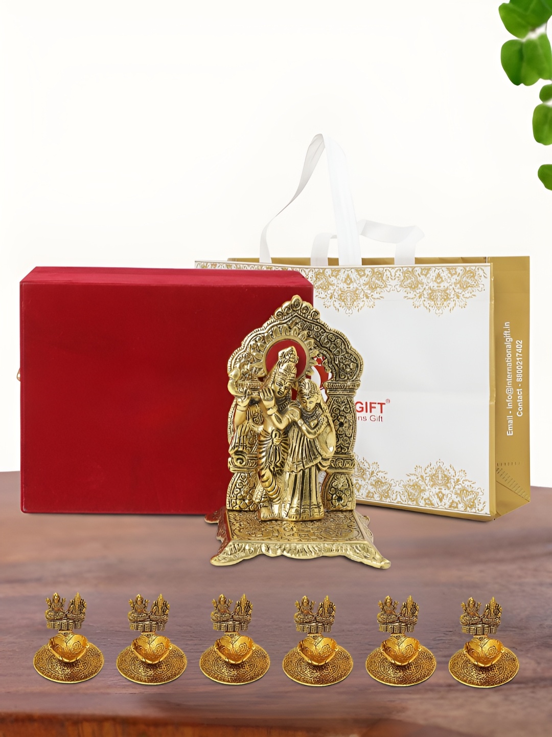 

INTERNATIONAL GIFT Gold Plated Radha Krishna Chowki with 6 Diya Box and Bag