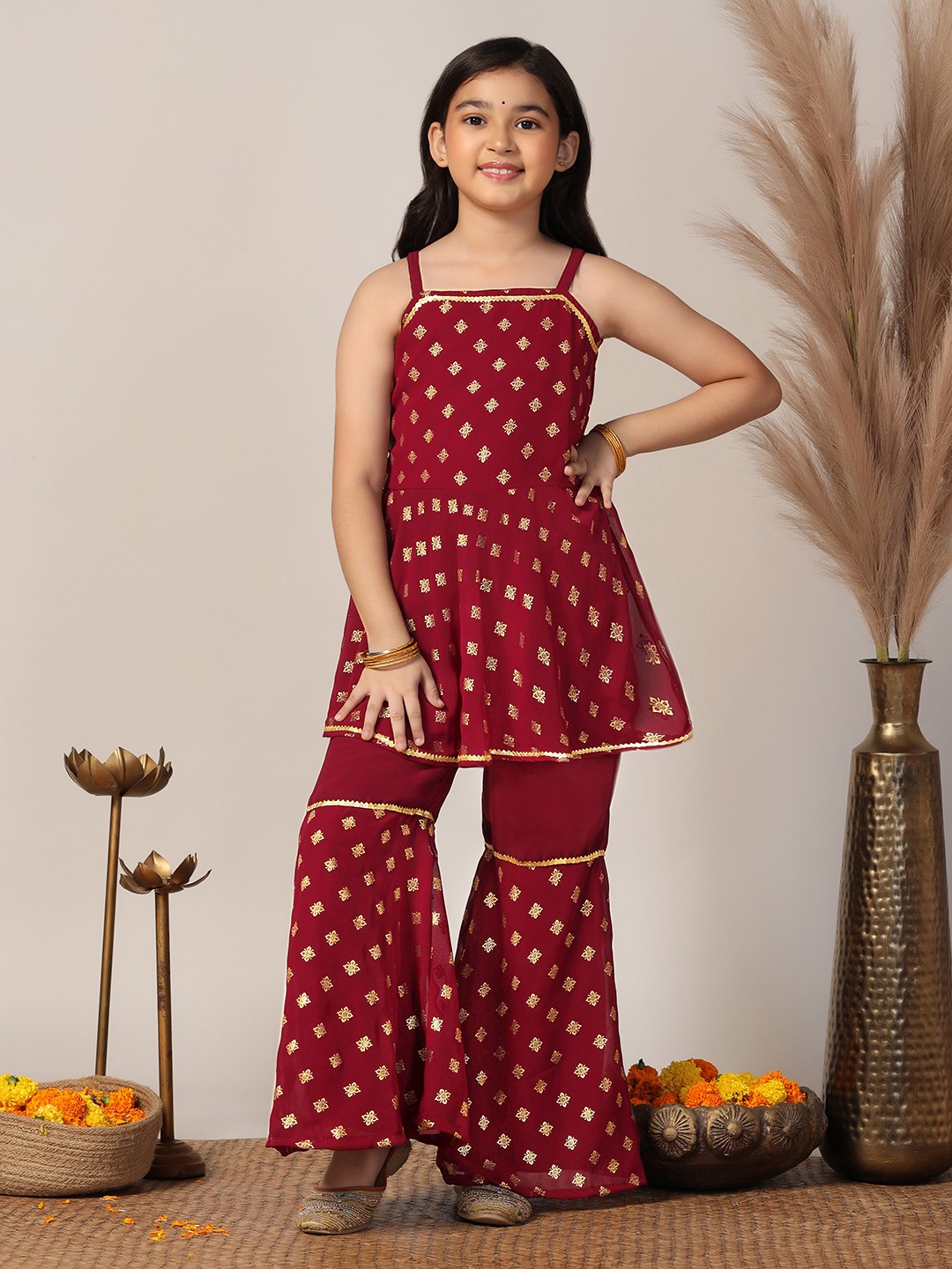 

Sangria Maroon Girls Ethnic Motifs Foil Printed A-Line Georgette Kurti With Sharara