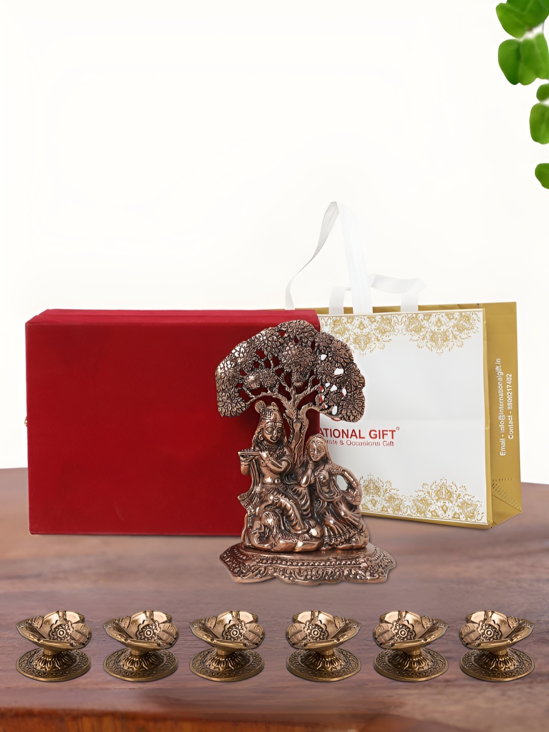 

INTERNATIONAL GIFT Brown Radha Krishna Idol with 6 Diya and Box