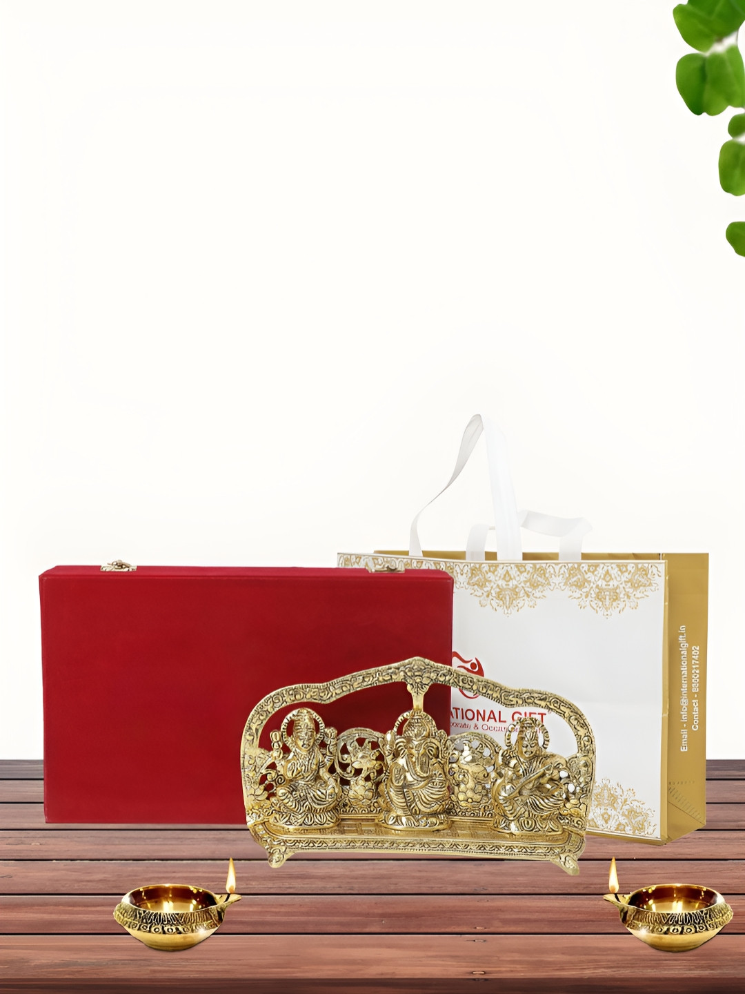 

INTERNATIONAL GIFT Gold Plated Laxmi Ganesh Saraswati Idol with 2 Diya and Box