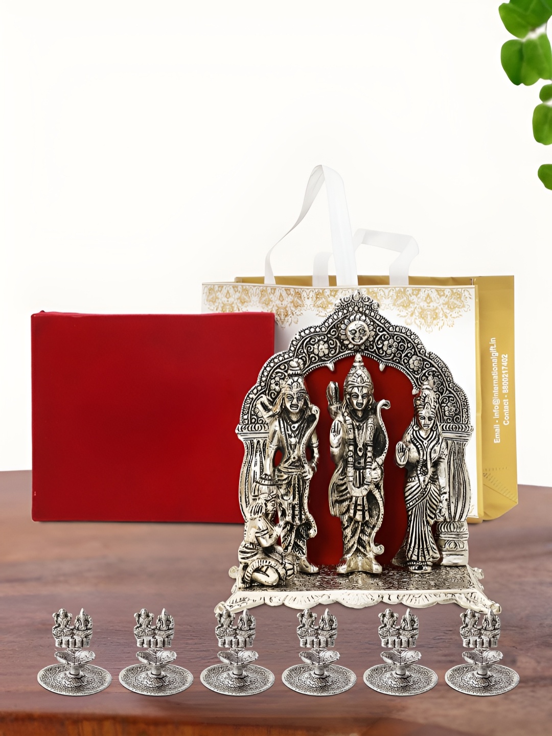 

INTERNATIONAL GIFT Silver Plated Ram Darbar Idol with 6 Diya Box and Bag