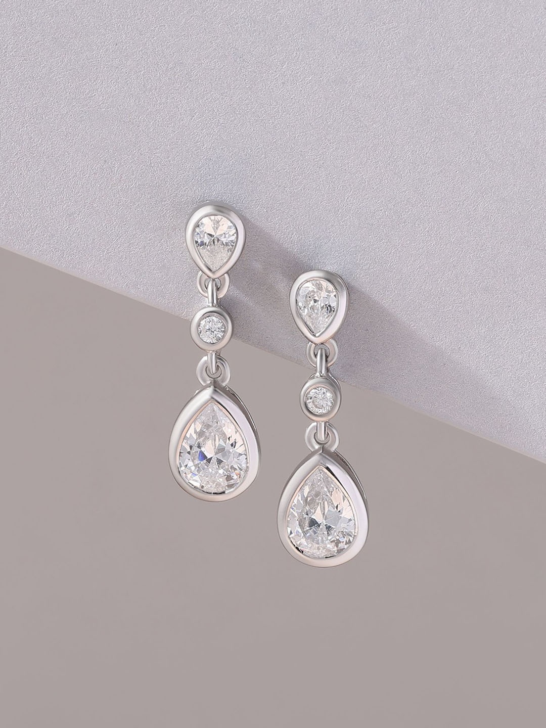 

Ornate Jewels 925 Silver Rhodium-Plated American Diamond Studded Teardrop Shaped Studs, White