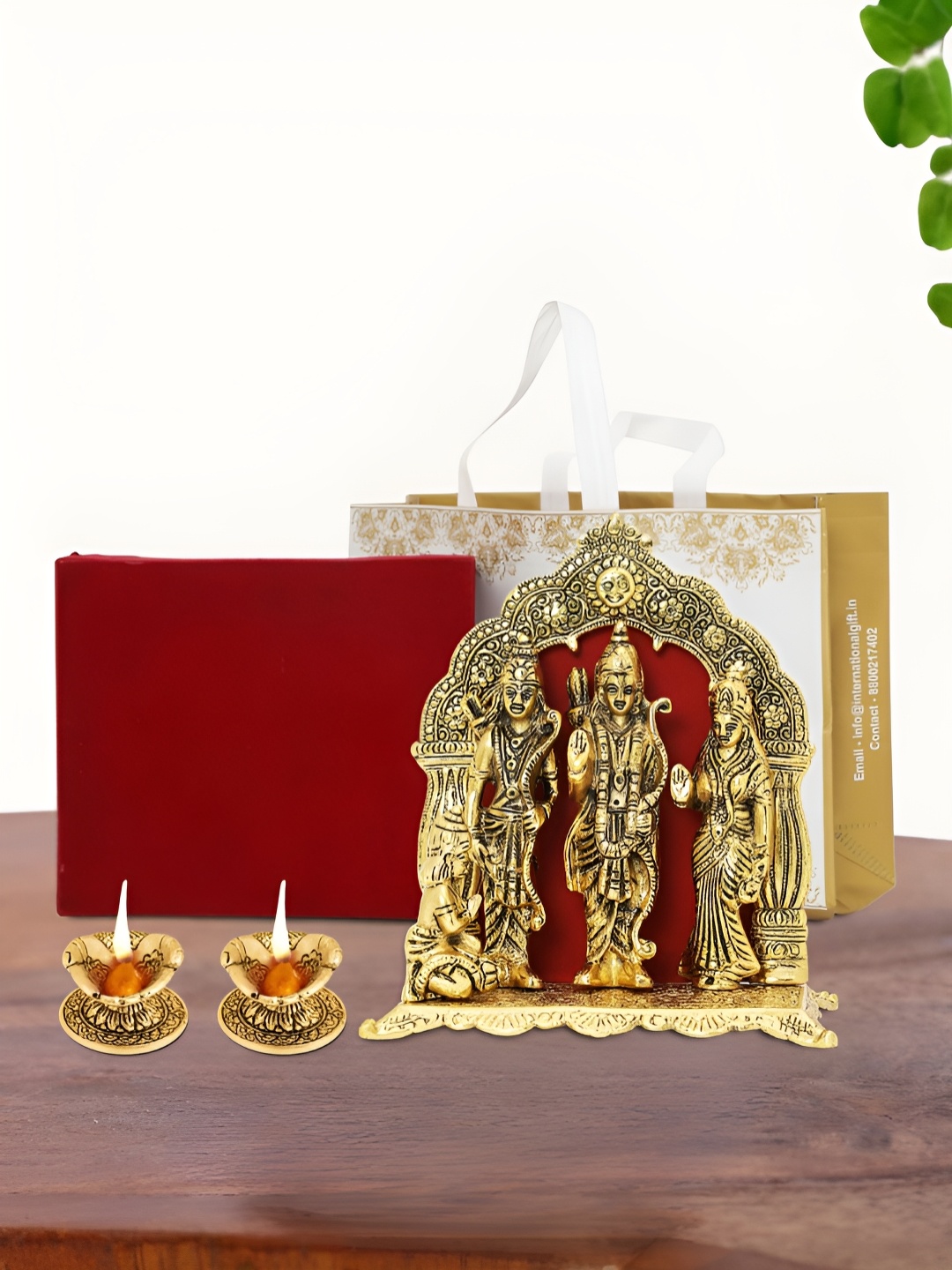 

INTERNATIONAL GIFT Gold Plated Ram Darbar Idol with 2 Diya Box and Bag