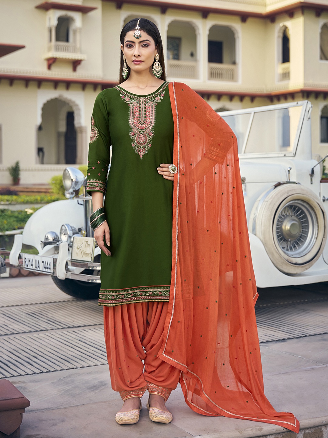 

Anouk Green Ethnic Motifs Embroidered Zari Work Unstitched Dress Material