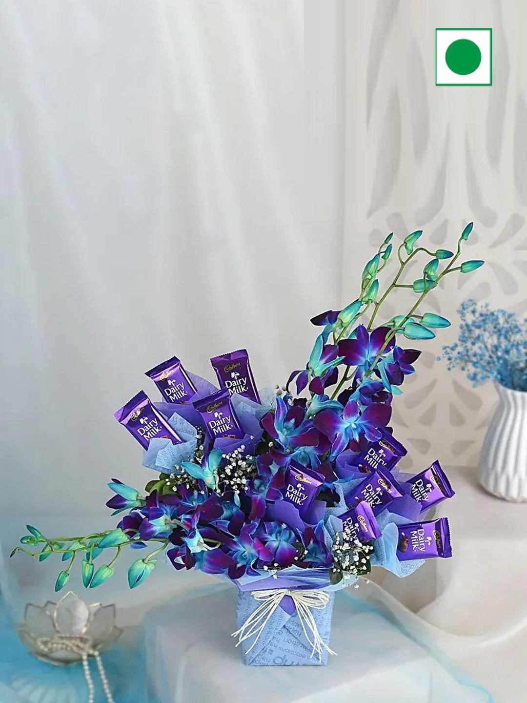 

fnp 5-Pcs Blue Orchids with 10-Pcs 10 Cadbury Dairy Milk Chocolates