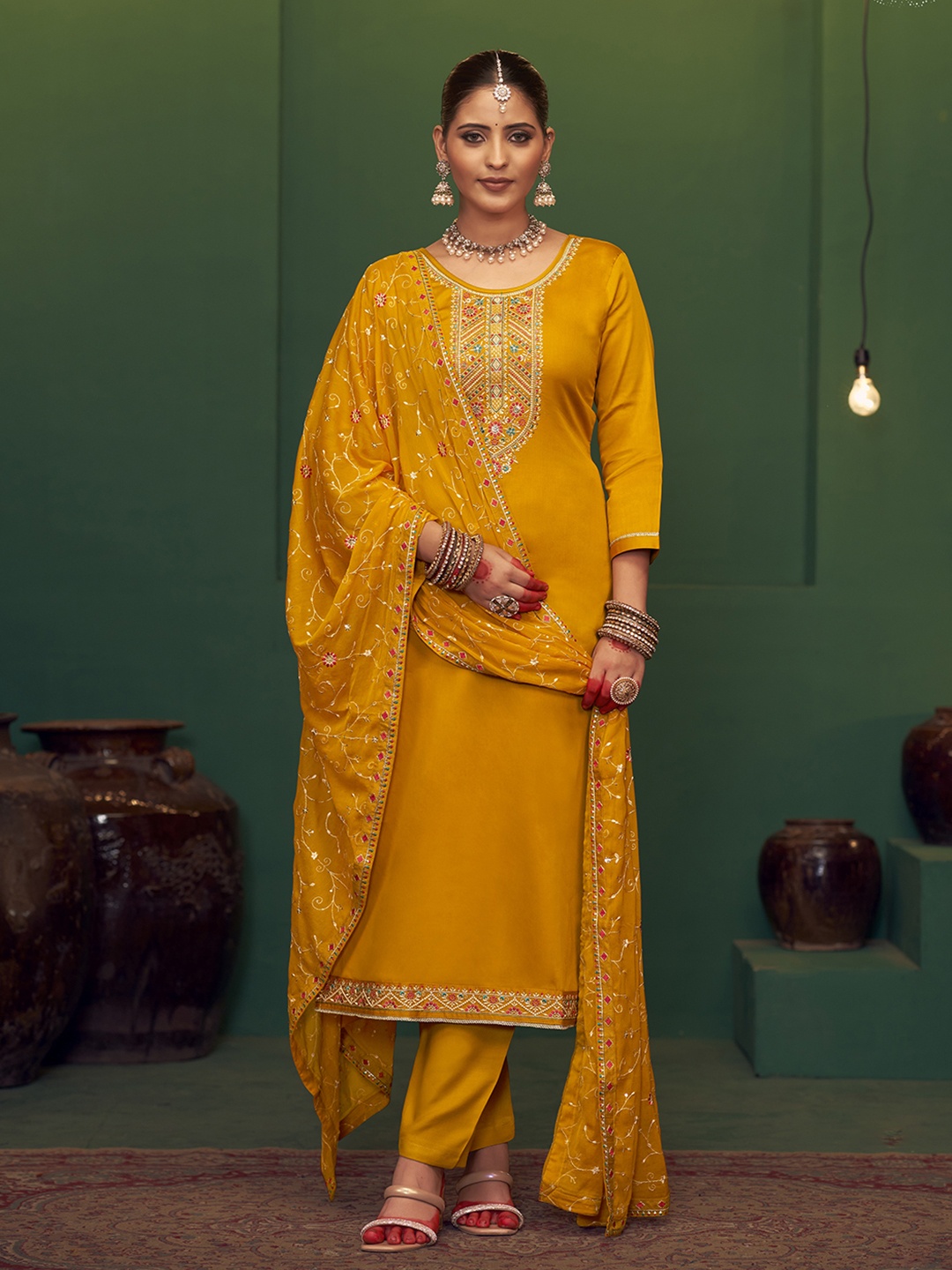 

Anouk Yellow Ethnic Motifs Embroidered Sequinned Unstitched Dress Material