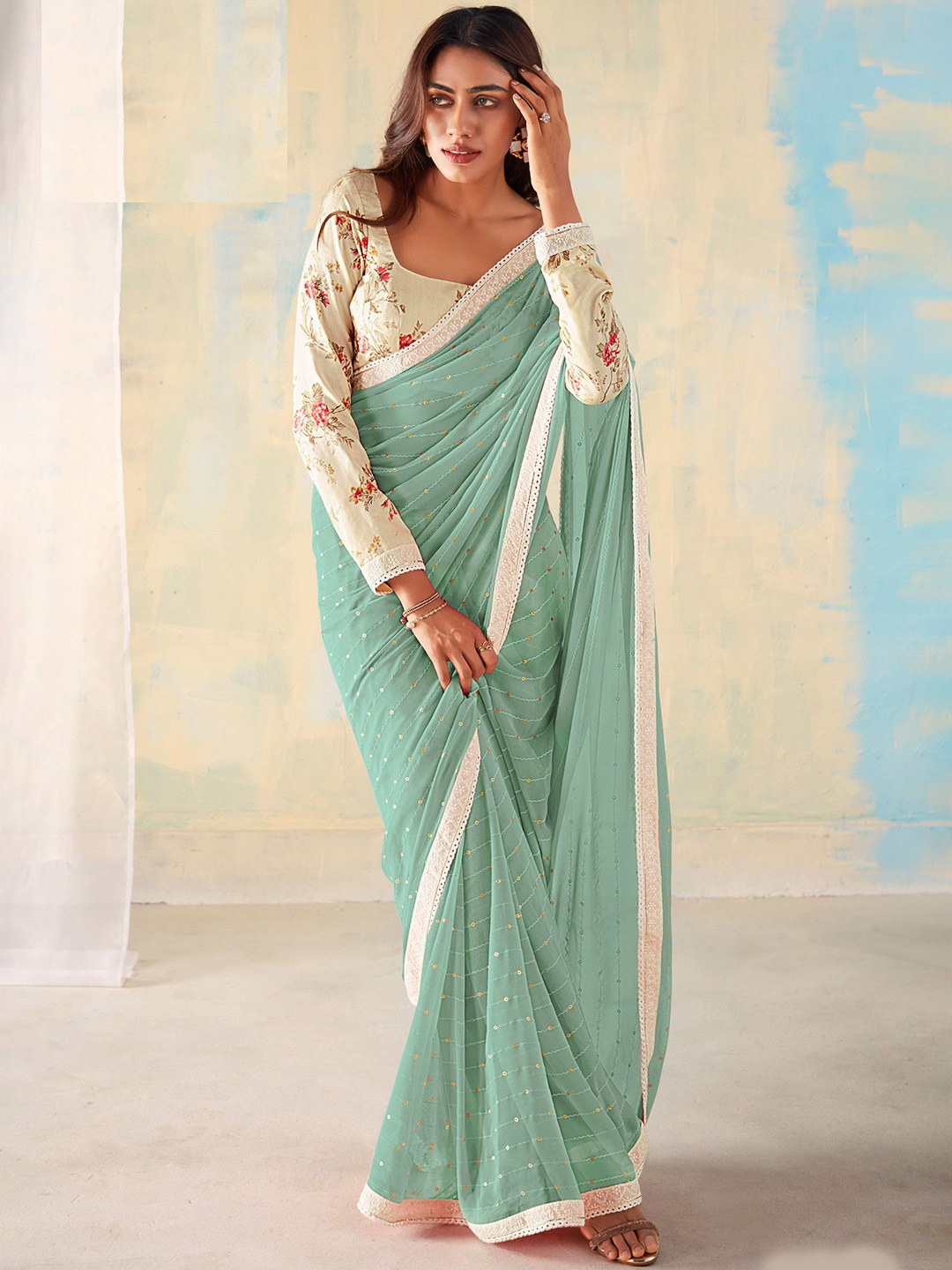 

DIVASTRI Embellished Poly Georgette Designer Saree, Sea green