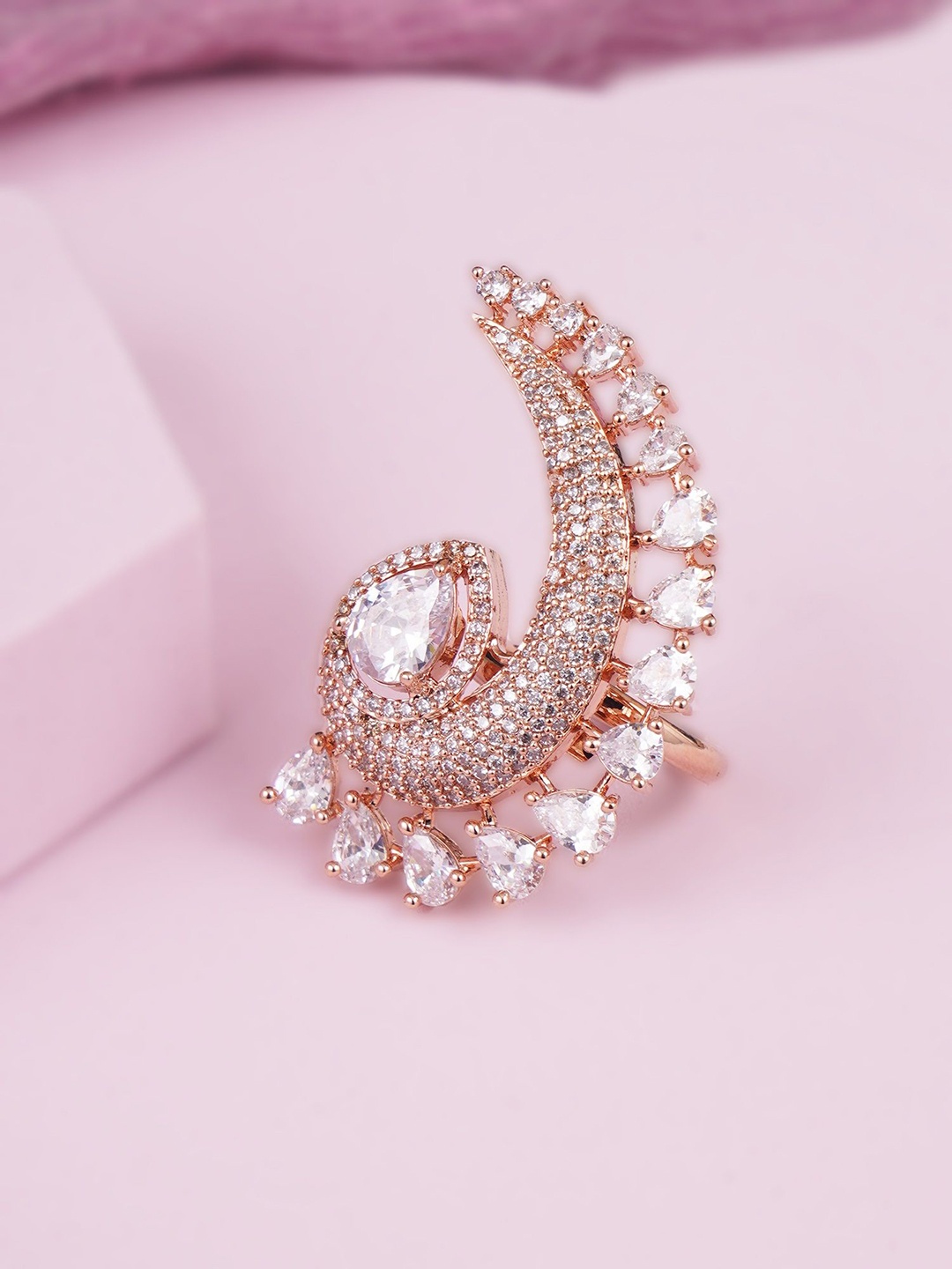 

Adwitiya Collection Rose-Gold Plated American Diamond Studded Carry Shape Adjustable Ring