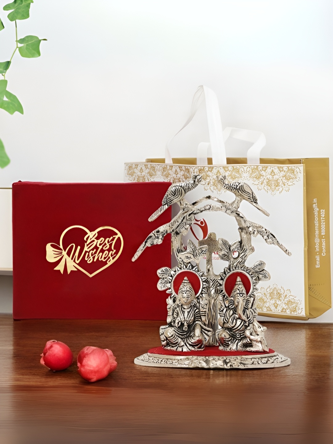 

INTERNATIONAL GIFT Silver-Toned Laxmi Ganesh Religious Idol Showpiece