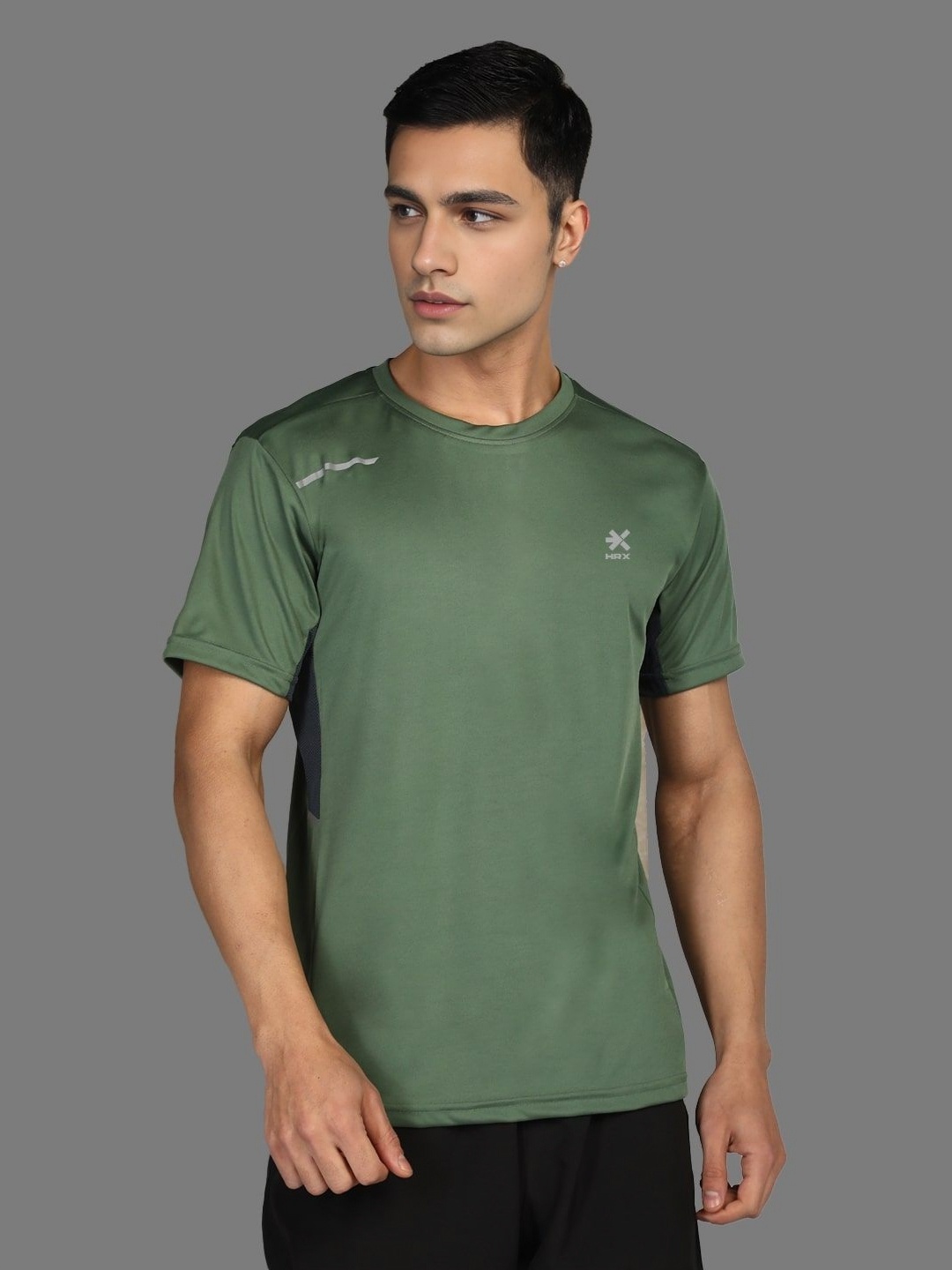 

HRX by Hrithik Roshan Men Solid Round Neck T-shirt, Green