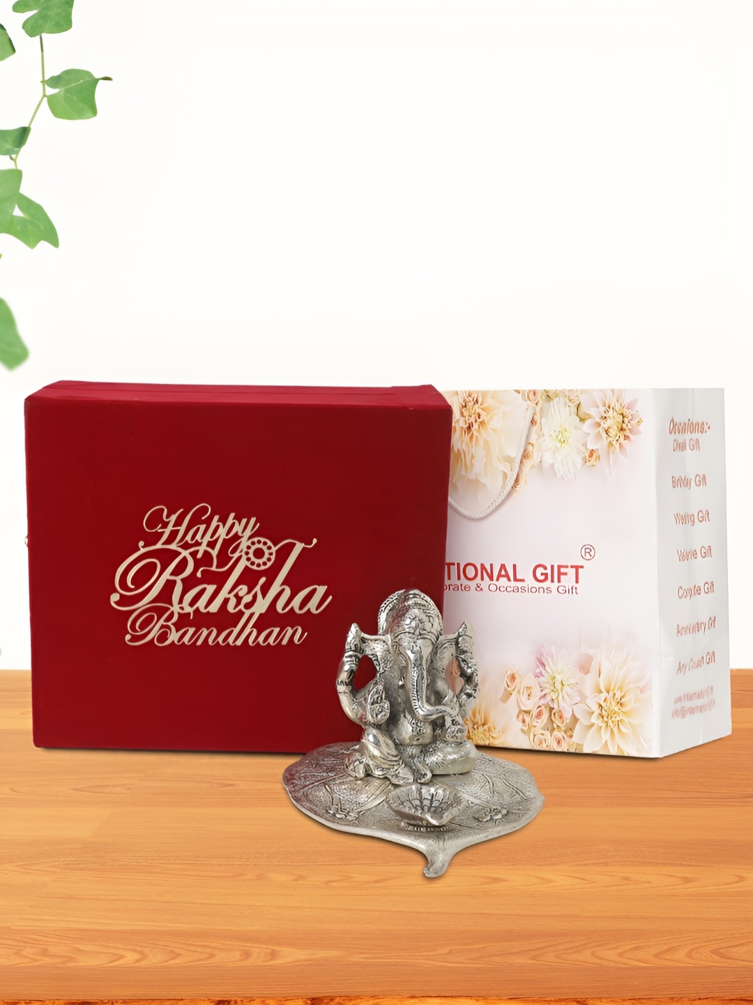 

INTERNATIONAL GIFT Silver-Toned Patta Ganesh Religious Idol Showpiece With Box