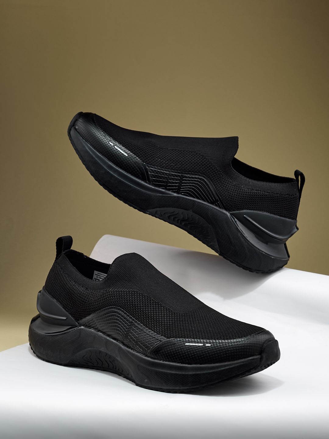 

Campus Men Slip-On Sneakers, Black