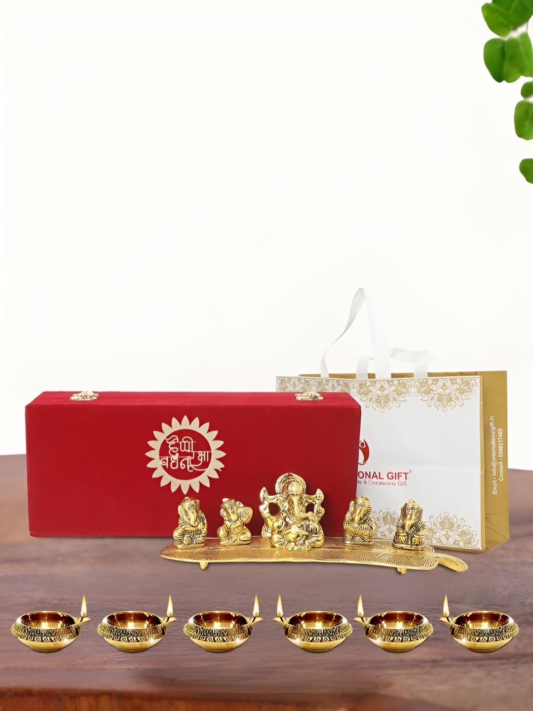 

INTERNATIONAL GIFT Gold-Toned Lord Ganesha & 6 Diya Religious Idol Showpiece