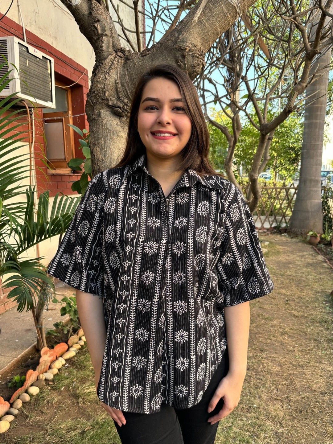 

Sanskritam Women Printed Shirt Collar Pure Cotton Kantha Work Kurti Black abstract top