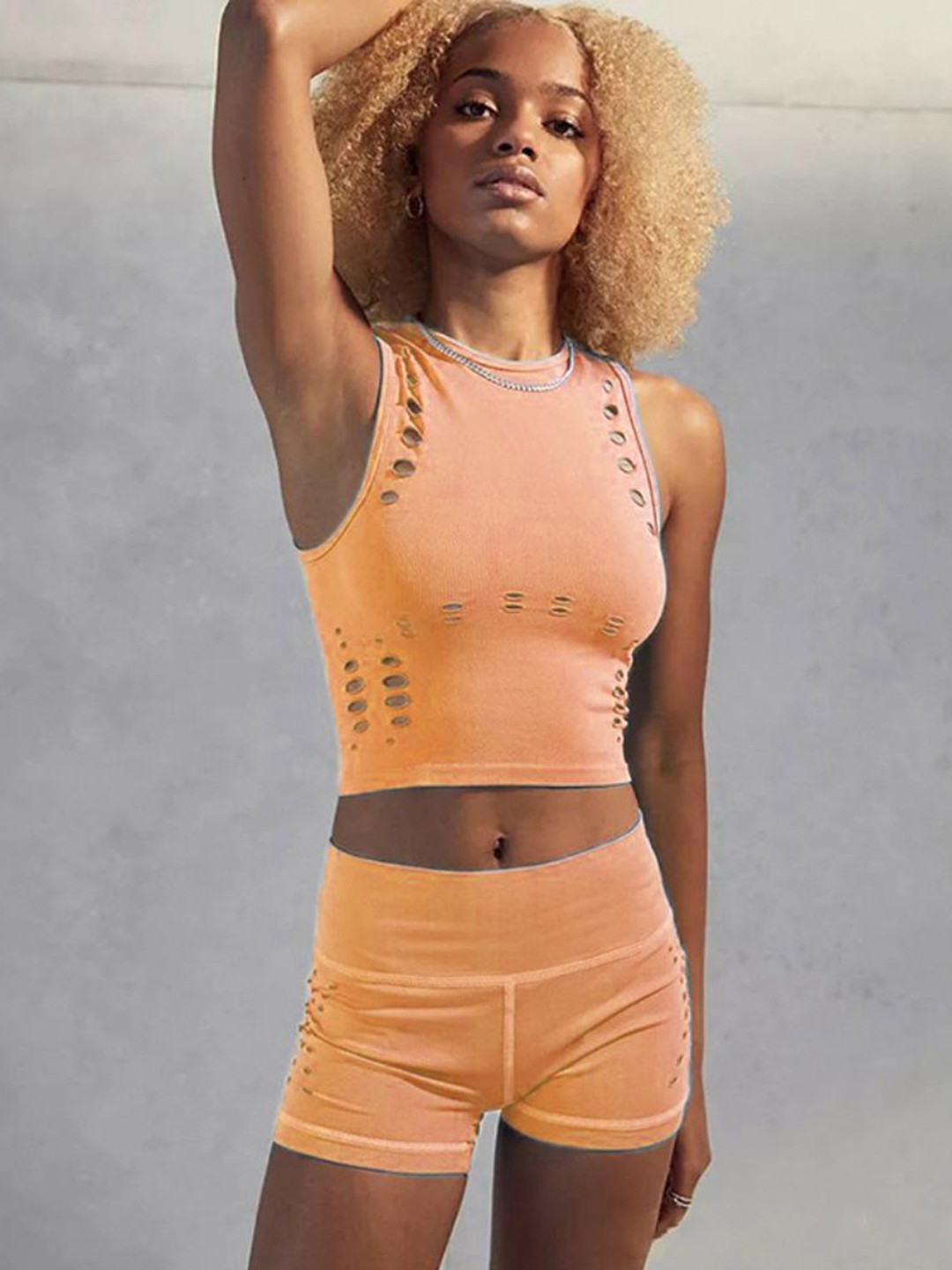 

StyleCast Orange Sleeveless Round Neck Top With Shorts