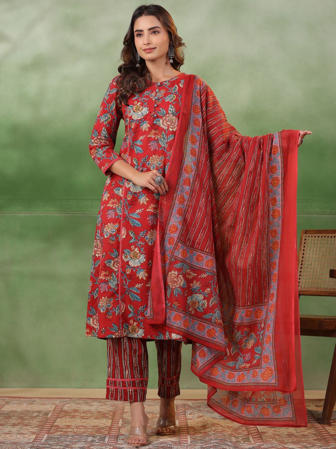 

Sangria Red Floral Printed V-Neck A-Line Cotton Kurta With Trousers & Dupatta, Maroon