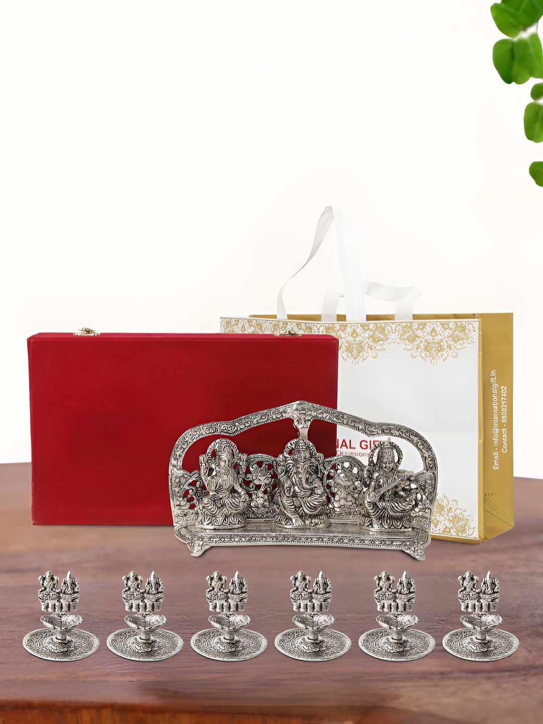 

INTERNATIONAL GIFT Silver Plated Laxmi Ganesh Saraswati Idol with 6 Diya and Box
