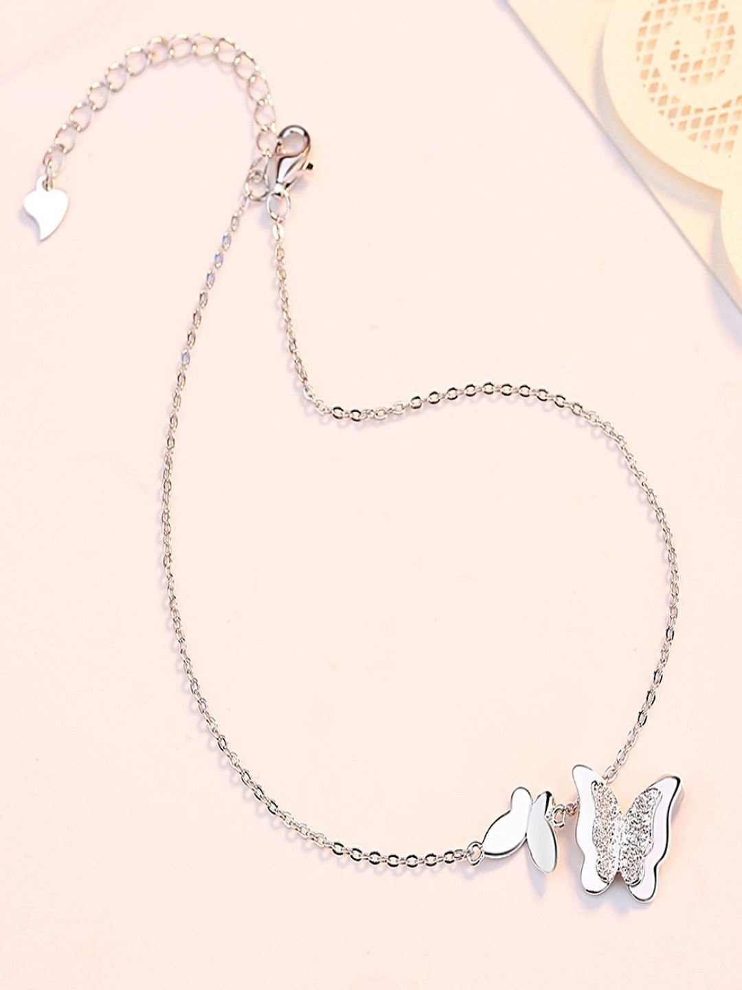 

DressBerry Silver-Plated Cubic Zirconia Studded Animal Butterfly Shaped Pendant With Chain