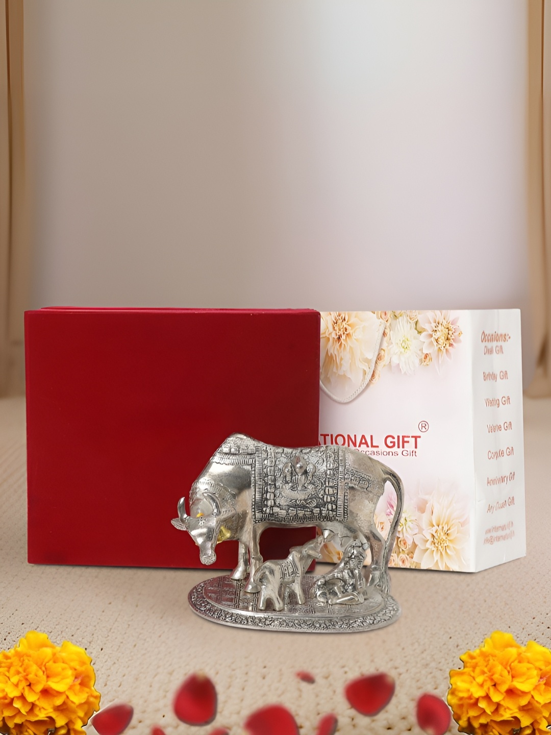 

INTERNATIONAL GIFT Silver-Toned Kamdhenu Cow Religious Idol Showpiece