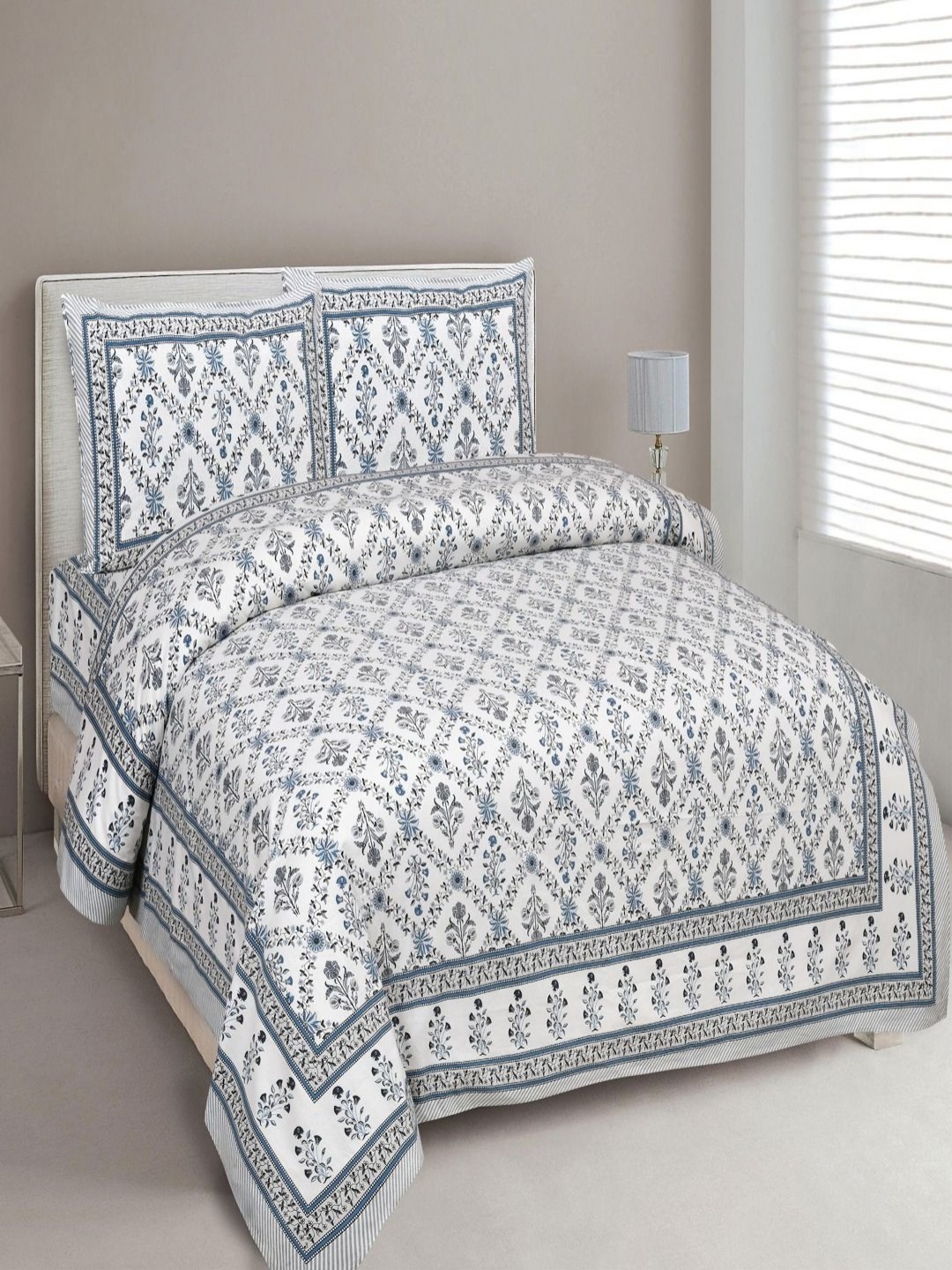 

Myntra Elegant Homes Blue & White Floral Printed 180 TC King Bedsheet Set-2.74 m x 2.54 m