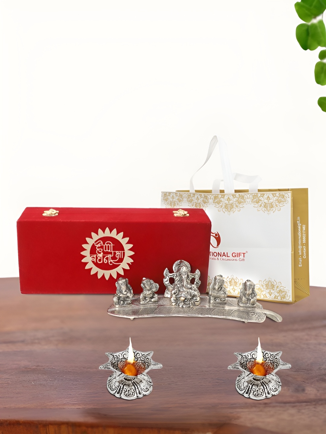 

INTERNATIONAL GIFT Silver Plated Musical Ganesha with 2 Diyas Religious Idol Showpiece