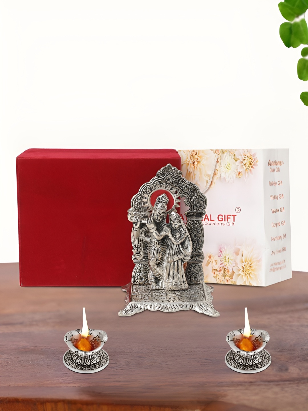 

INTERNATIONAL GIFT Silver Plated Radha Krishna Chowki with 2 Diya and Box
