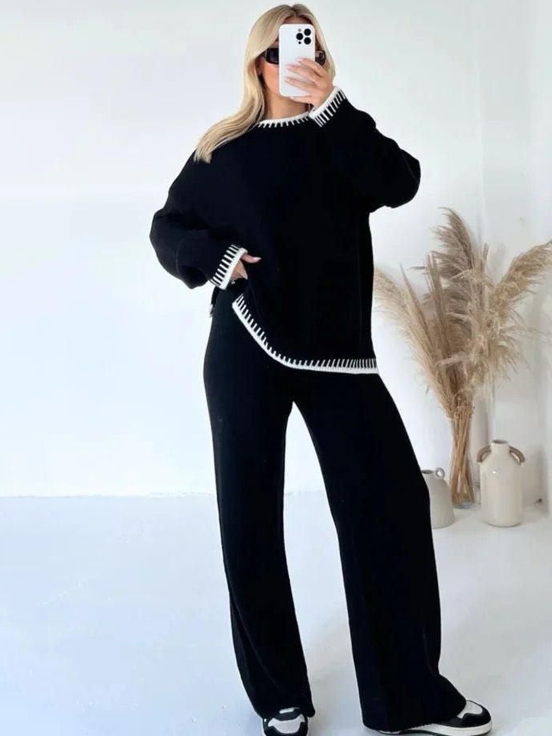 

Alamode By Akanksha Black Pure Woollen Palmer-Knitted Top & Trouser Co-Ords