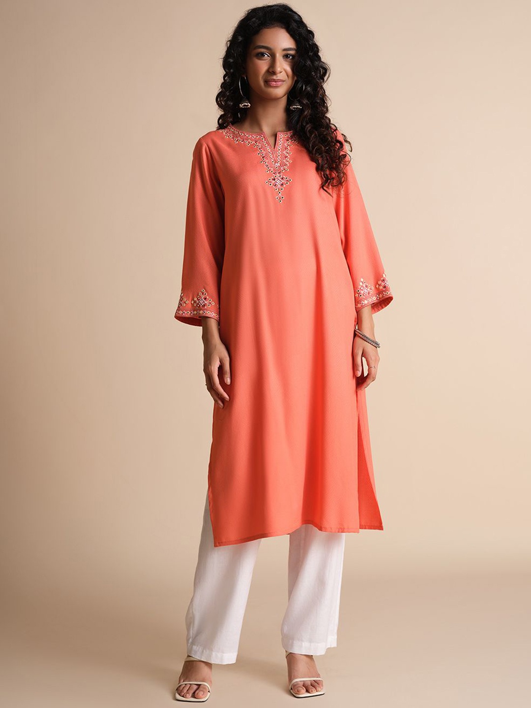 

Global Desi Women Keyhole Neck Flared Sleeves Kurta, Coral