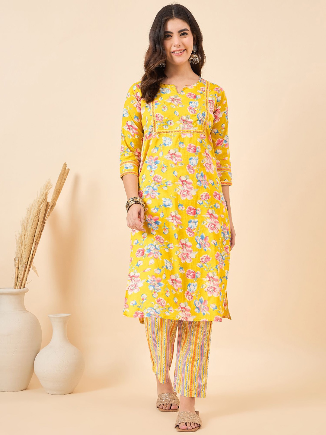 

Anouk Yellow Floral Printed Notch Neck Pure Cotton Kurta With Trouser