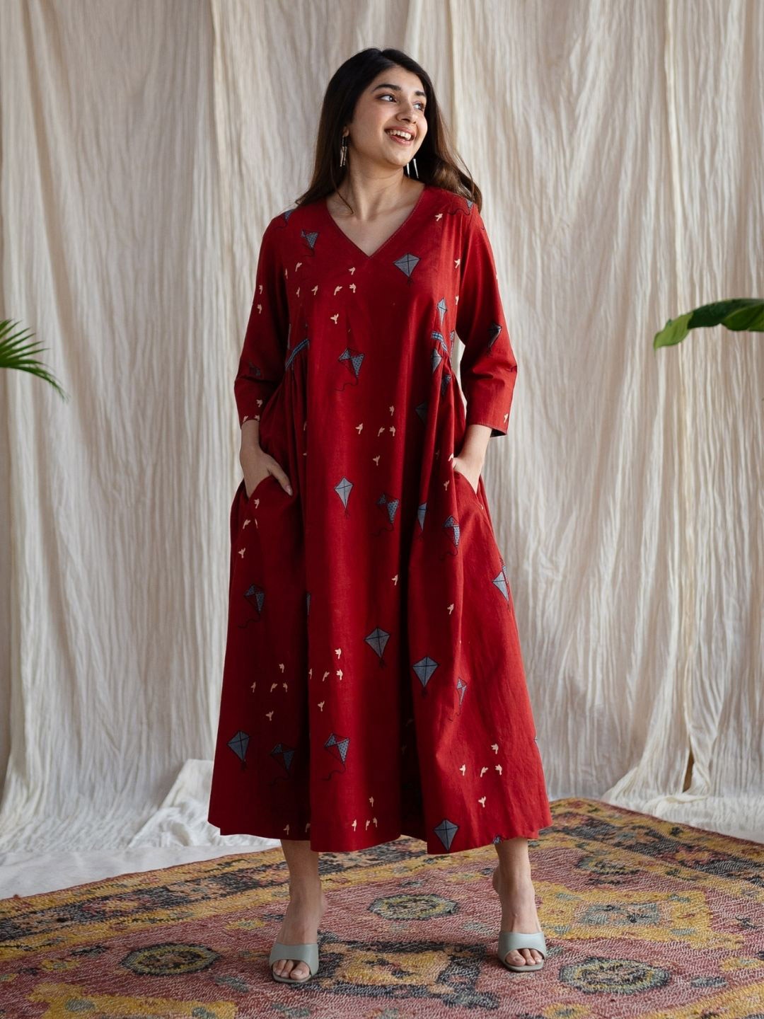 

THE INDIAN ETHNIC CO Women V-Neck Ajrakh Printed A-Line Cotton Midi Dress, Red