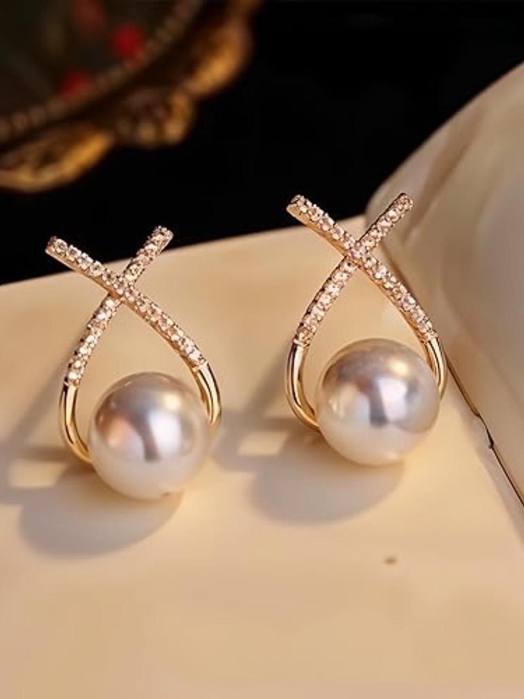 

DN Creation Gold-Plated Artificial Stones And Pearls Studded Contemporary Studs