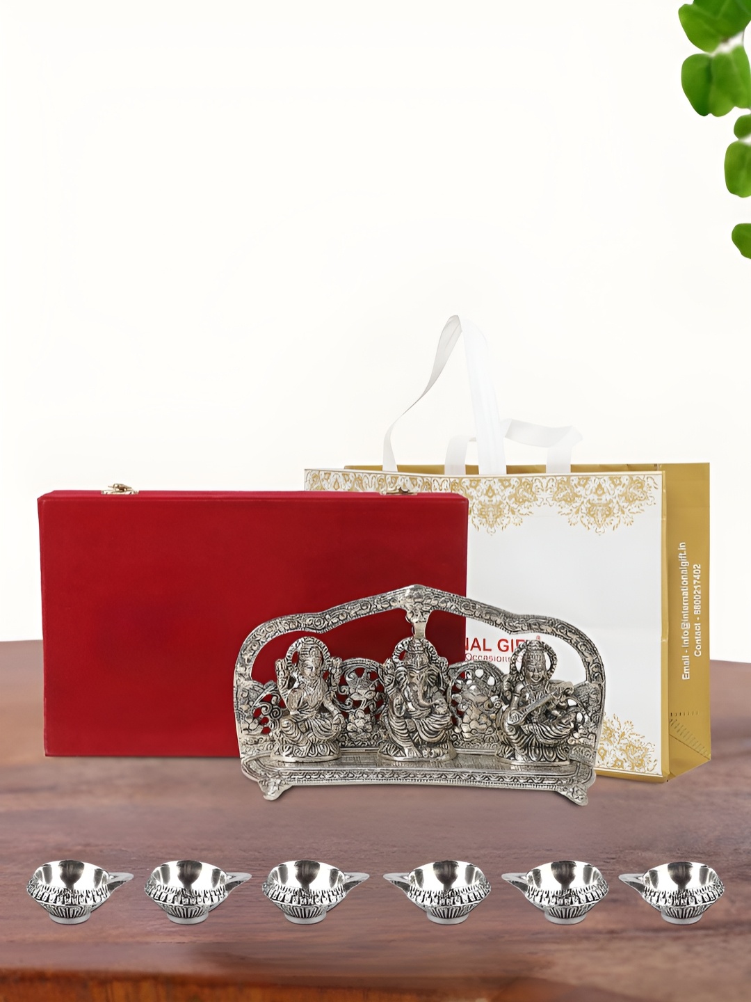 

INTERNATIONAL GIFT Silver Plated Laxmi Ganesh Saraswati Idol with 6 Diya and Box