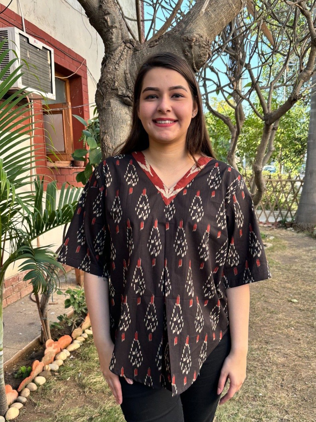 

Sanskritam Women Black Ikkat Print Kurtis