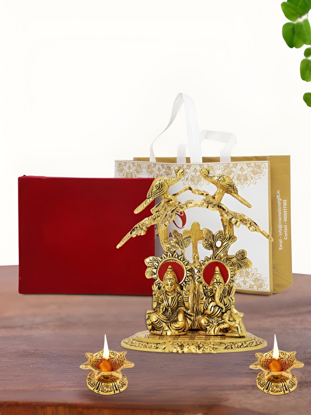 

INTERNATIONAL GIFT Gold Plated Laxmi Ganesh Idol with 2 Diya Box and Bag