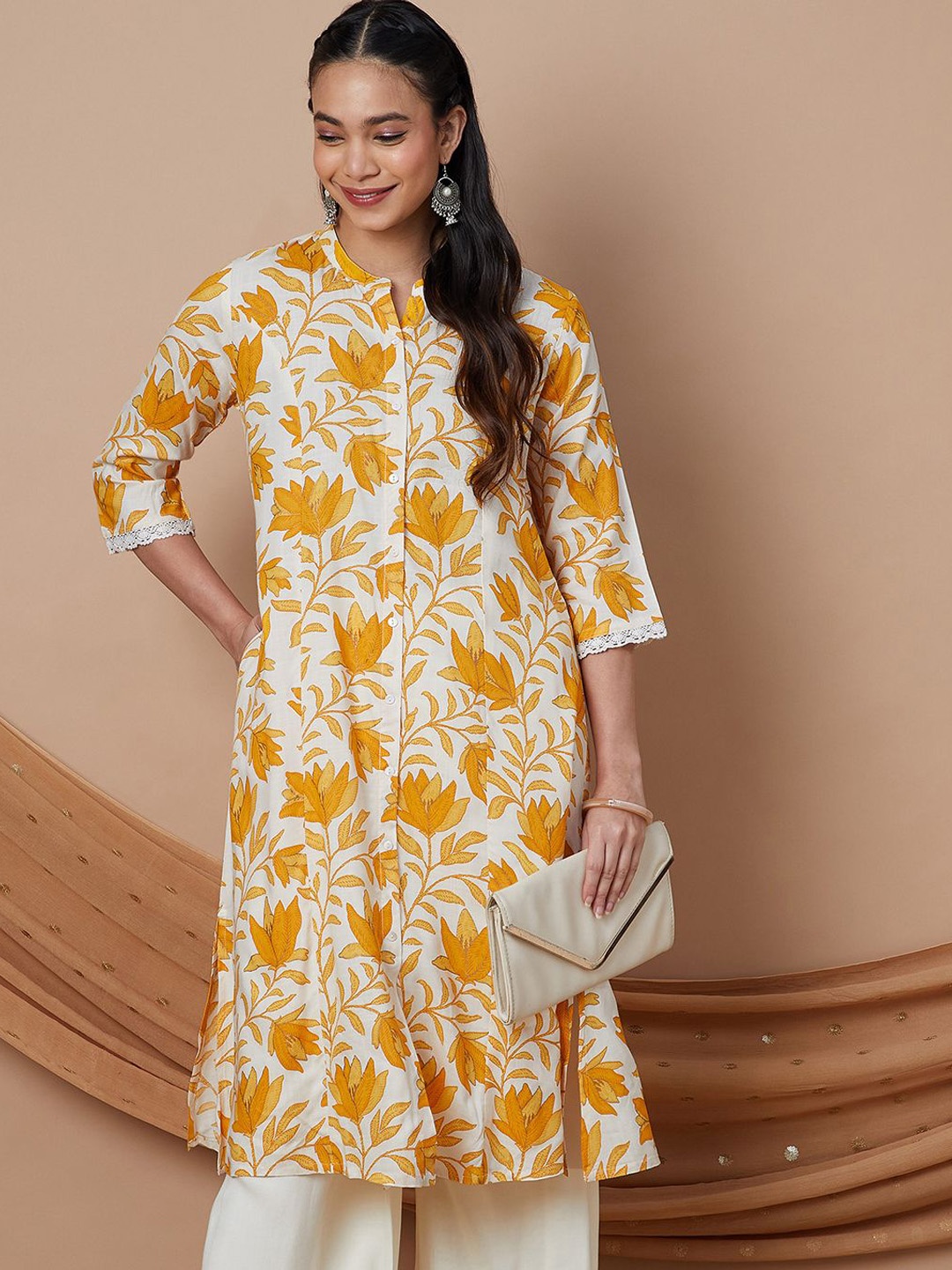 

Melange by Lifestyle Floral Printed Mandarin Collar A-Line Pure Cotton Kurta, Mustard