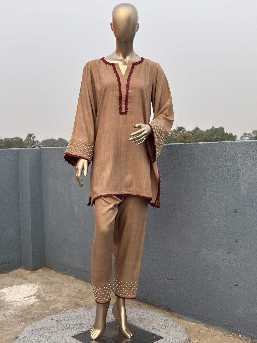 

Kihums Embroidered Notch Neck Thread Work Straight Kurta With Trousers, Beige